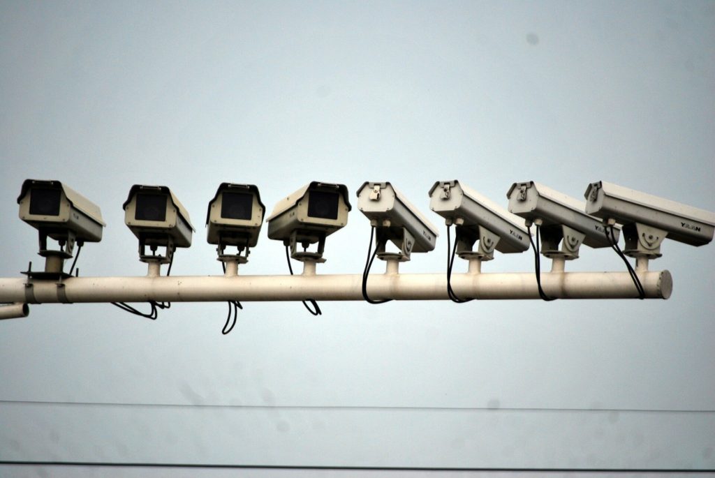 a row of traffic security cameras